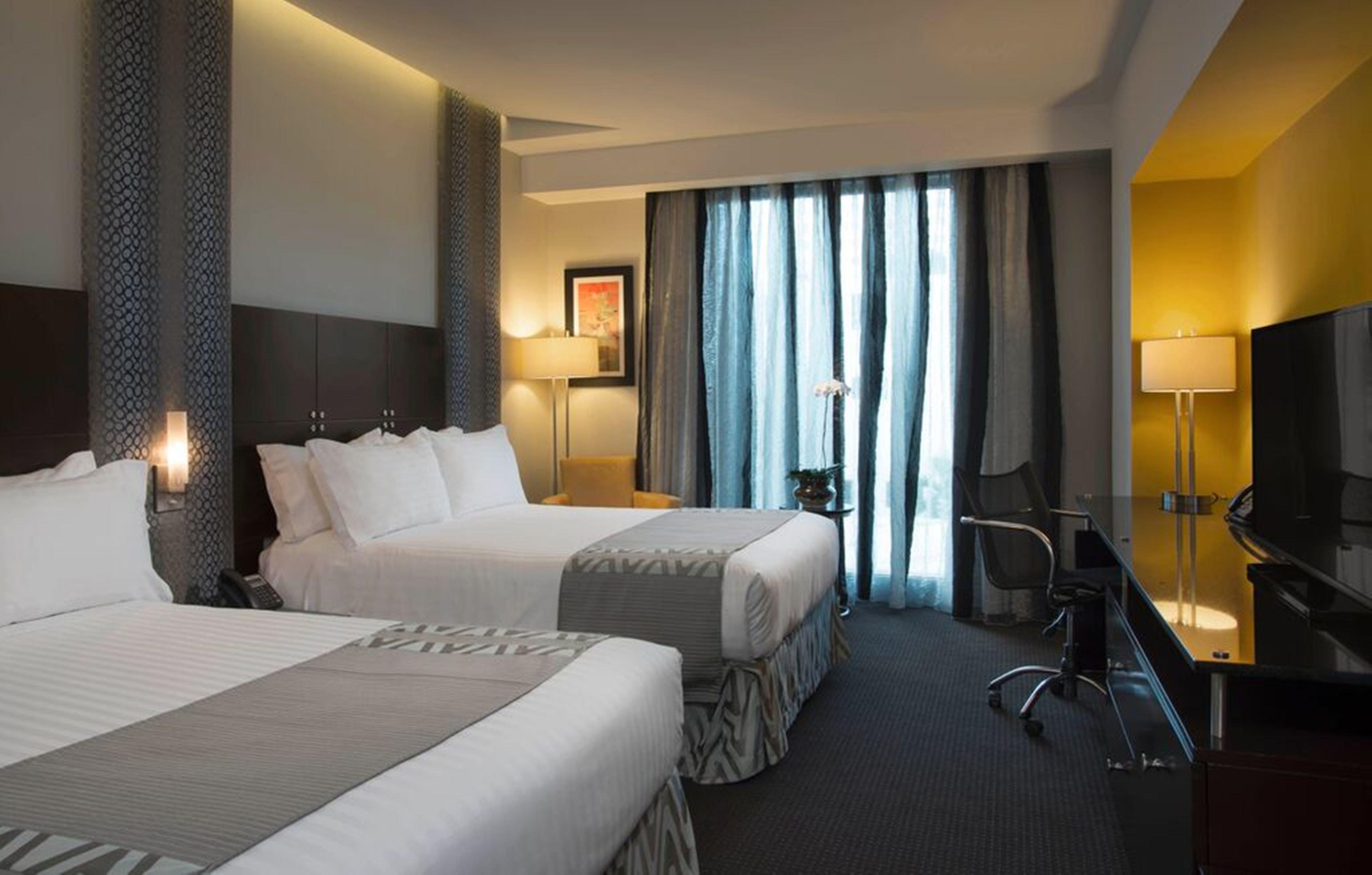 圣多明各假日套房酒店 聖多明哥 外观 照片 A room at the hotel